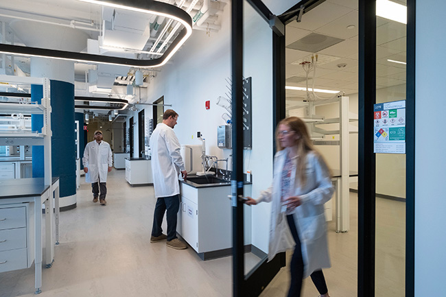 Lab workers at Entrada Therapeutics HQ in the Seaport