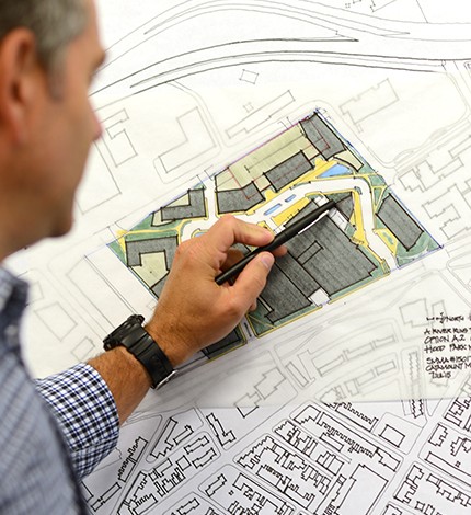 SMMA architect hand-drawing a site plan for Hood Park