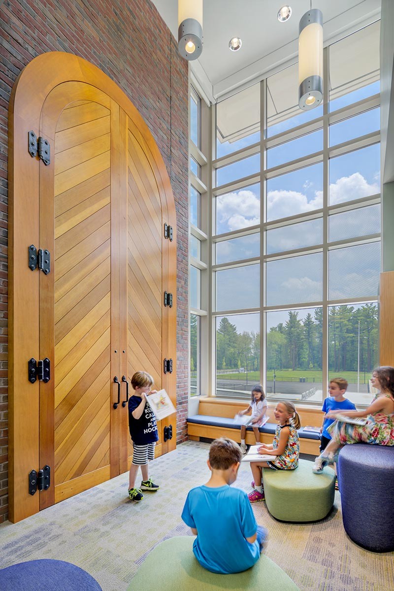 Bancroft Elementary School commons with large wooden door